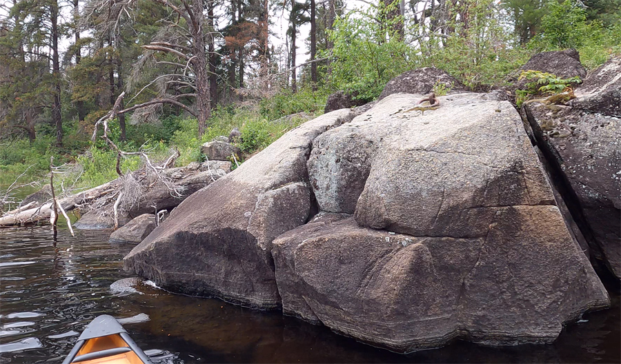 Metal rings in rock near old cabin 2